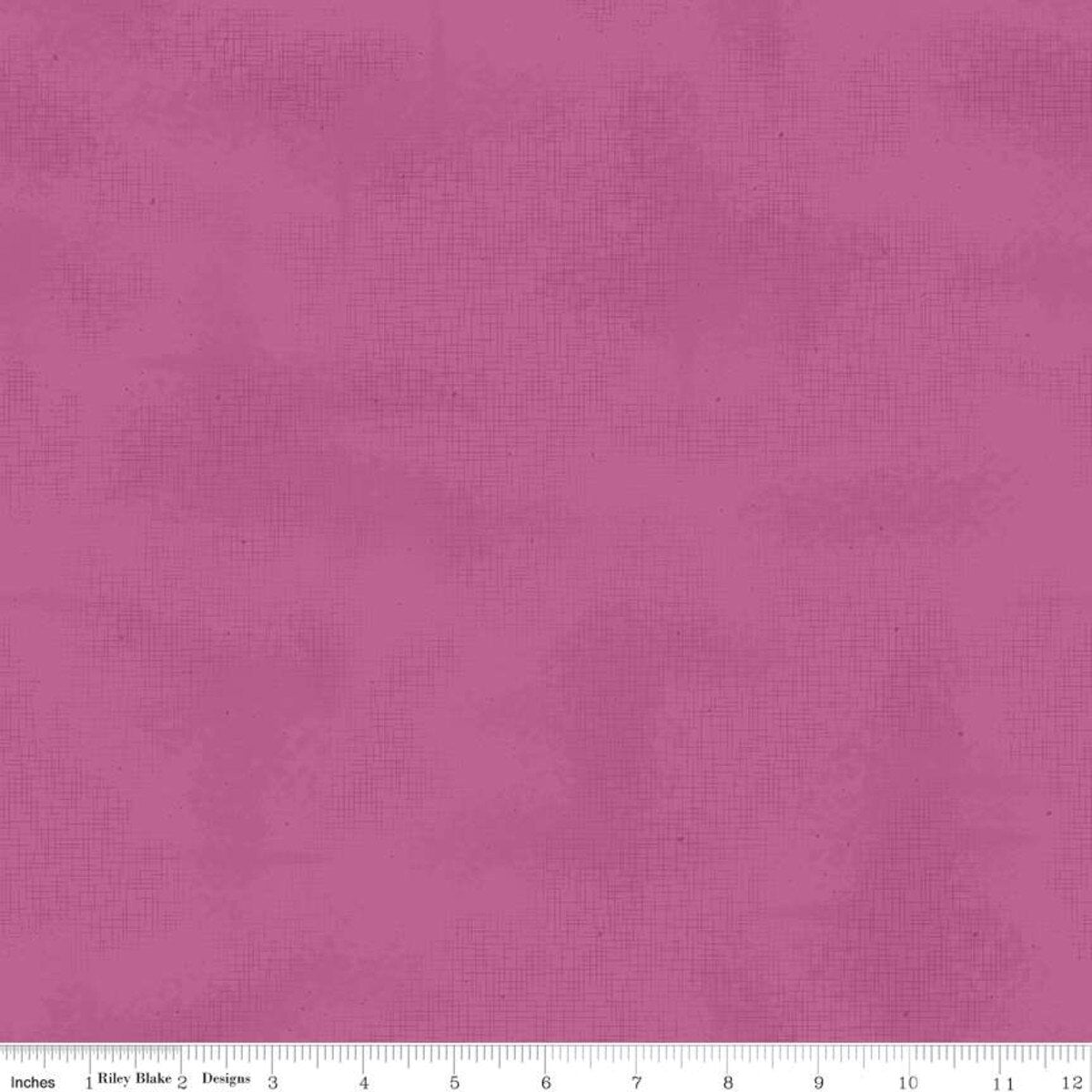 Solid pink fabric texture with a subtle pattern