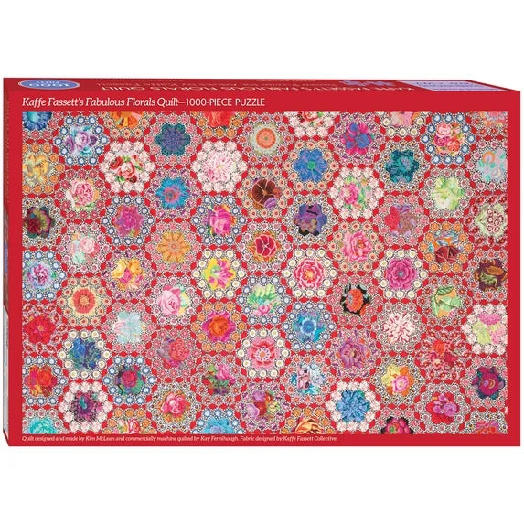 Jigsaw puzzle box with colorful floral pattern on a red background