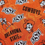 Patterned fabric with 'Oklahoma State Cowboys' text and logo on an orange background