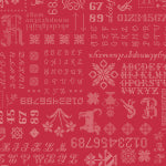 Red fabric with Christmas patterns and text on a red background