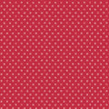 Red fabric with small white polka dots