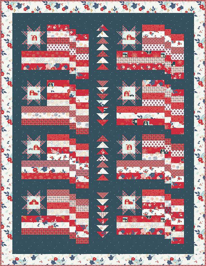 Quilt with red, white, and blue pattern on a blue background