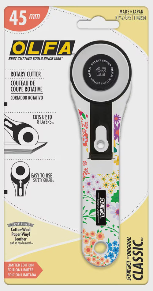 OLFA rotary cutter with floral design on packaging