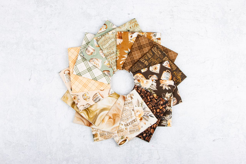 Collection of patterned fabric squares arranged in a circular fashion on a light background