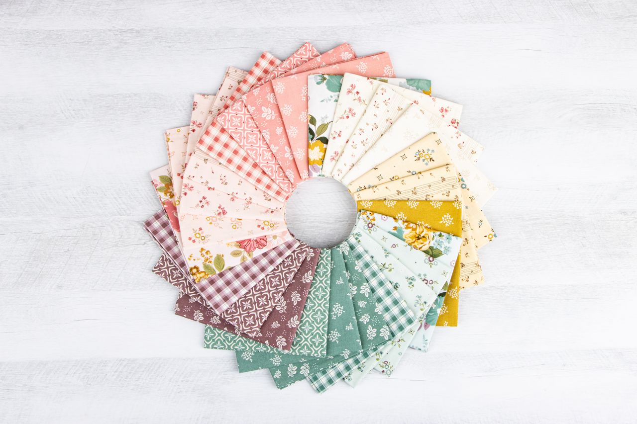 Collection of colorful fabric swatches arranged in a circular pattern on a white background